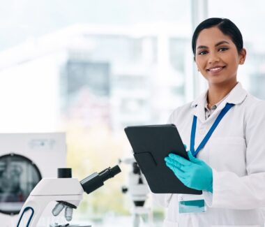 New York Blood Center lab researcher with a computer tablet