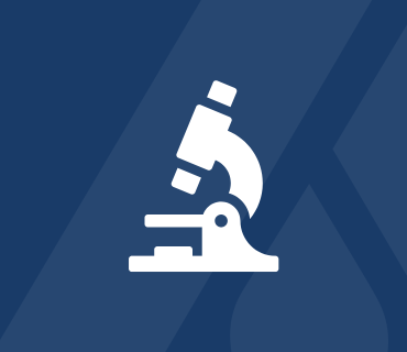 white microscope on blue background
